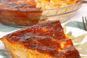 slice of Vidalia Onion Pie with text overlay of recipe name.