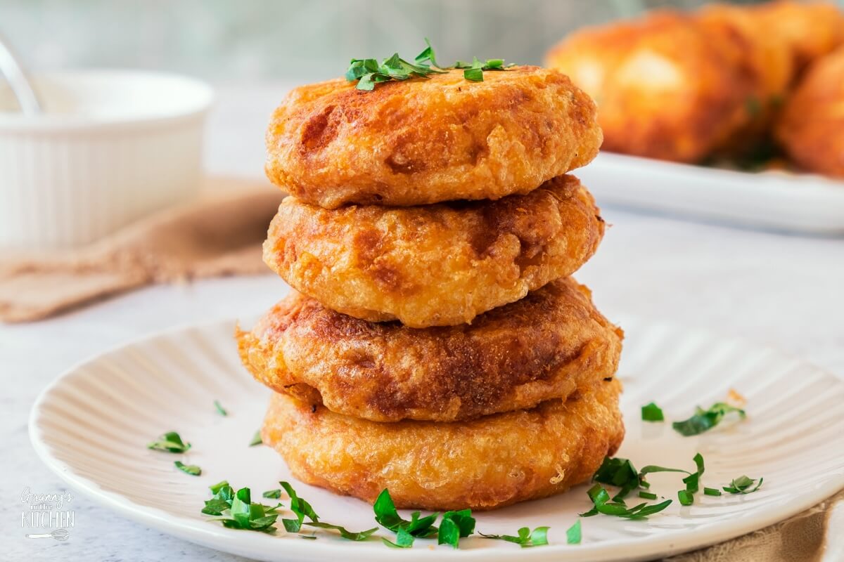 A stack of Potato Fritters on a plate.