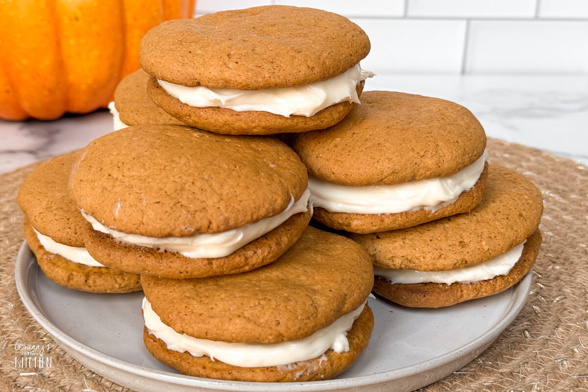 a plate of pumpkin whoopee pies.