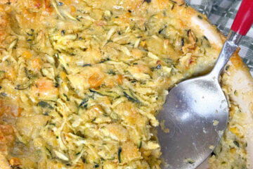 Zucchini Cornbread Casserole in dish, with text overlay of recipe name.