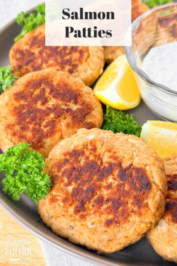 salmon patties on a plate, with text overlay "Salmon Patties"