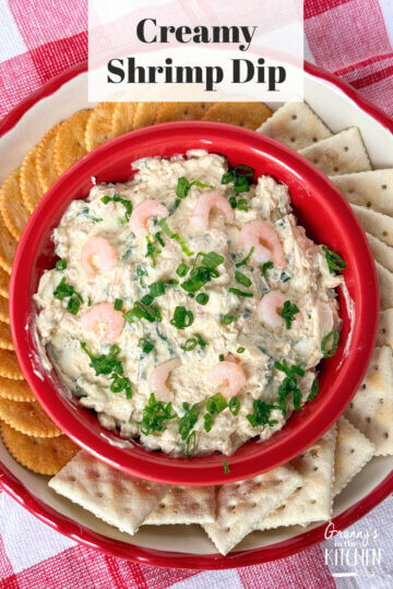 Creamy Shrimp Dip in a red bowl with crackers.
