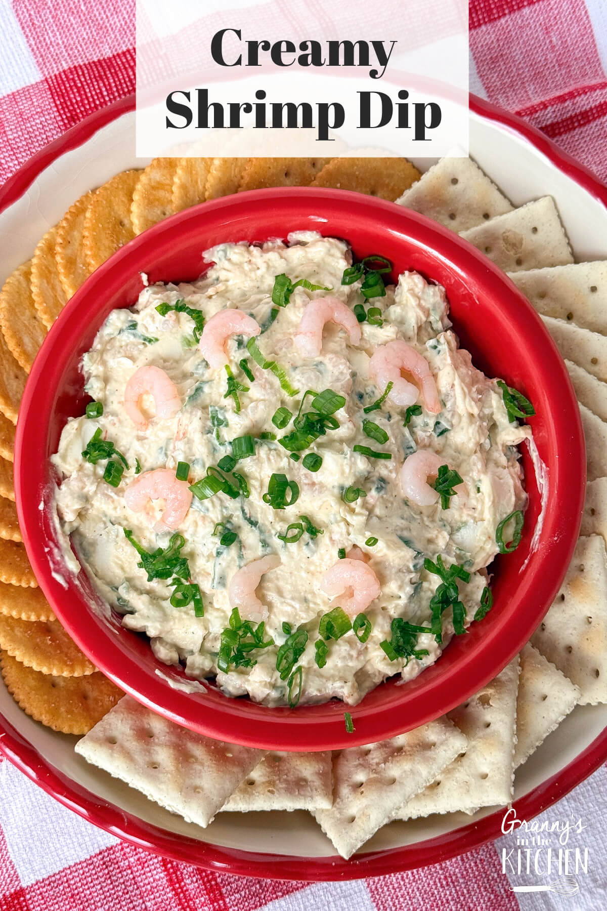 Creamy Shrimp Dip in a red bowl with crackers.