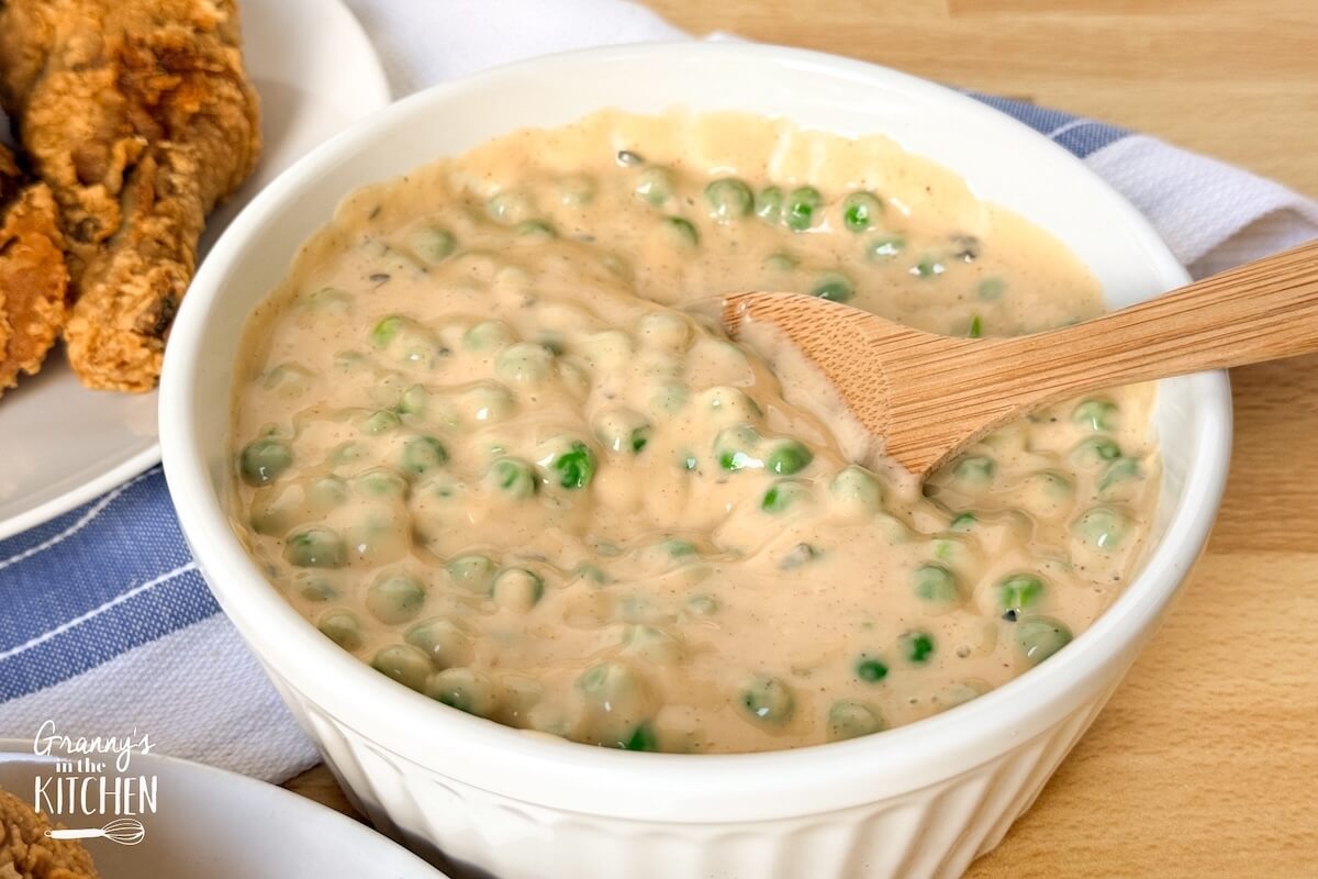 a bowl of cheesy peas.