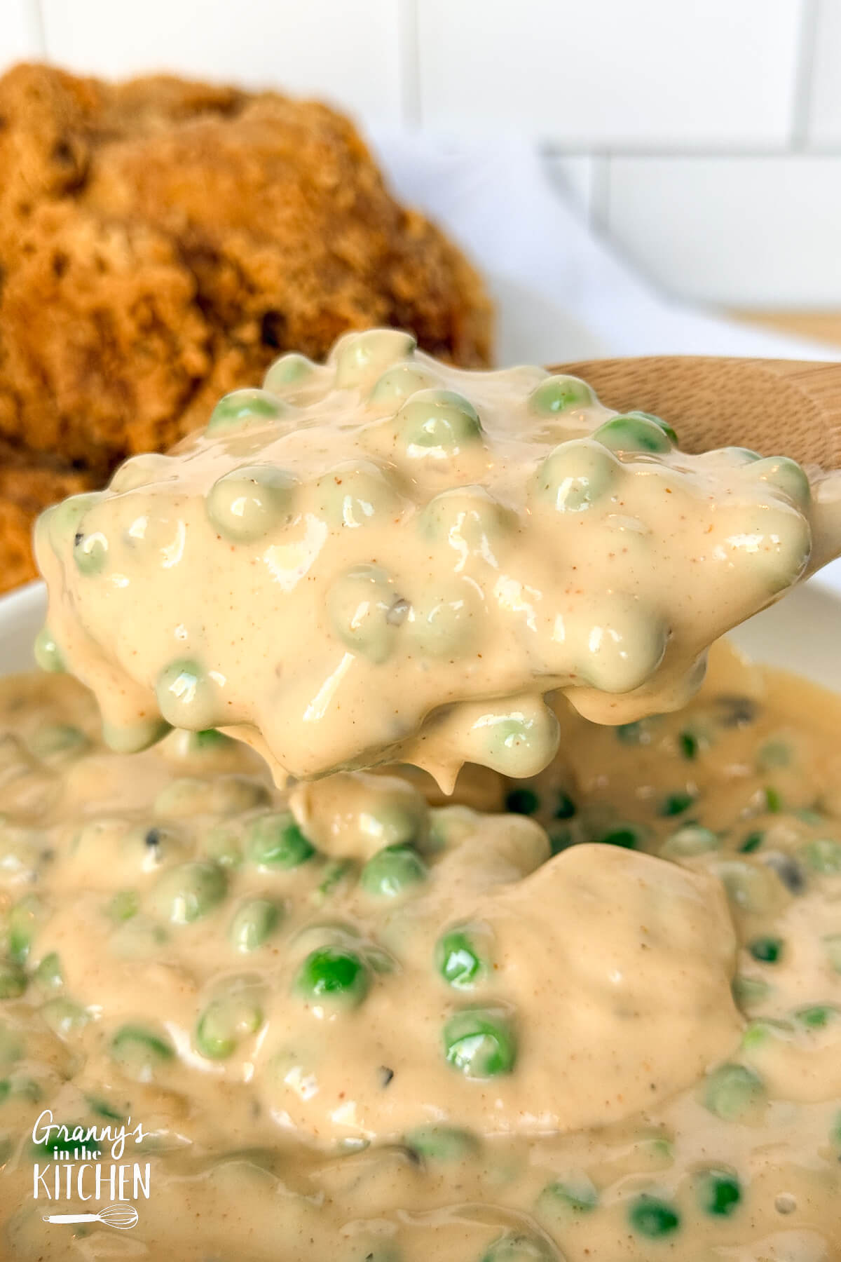a scoop of cheesy peas.
