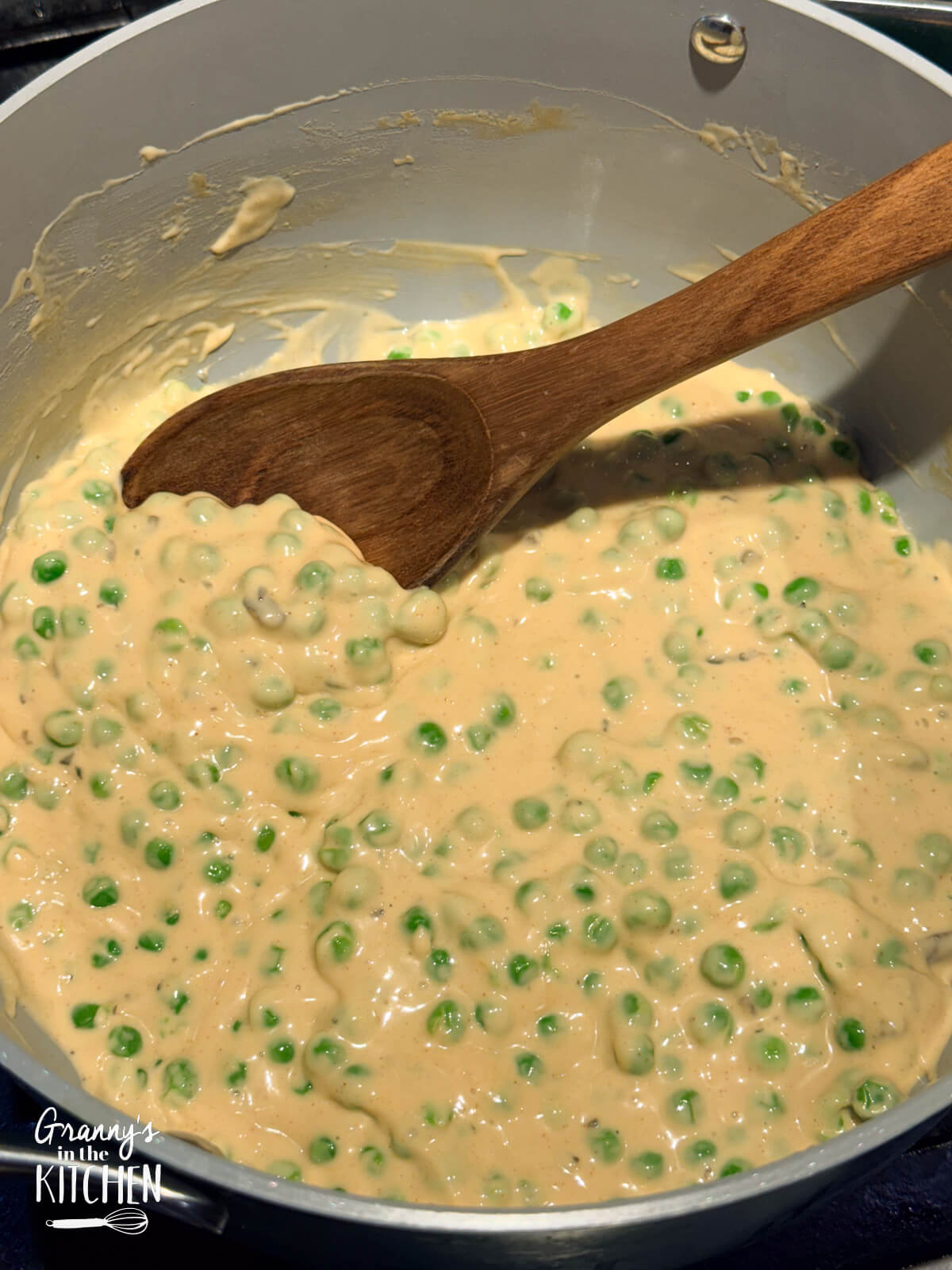 a big pot of peas in a creamy cheese sauce.