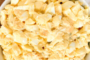 top-down view of a bowl of egg salad with text overlay "Classic Egg Salad."
