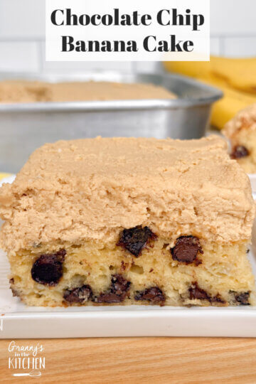 a slice of cake with chocolate chips and peanut butter frosting; text overlay "Chocolate Chip Banana Cake"