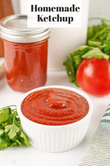 A white dish of Homemade Ketchup with a text overlay that says Homemade Ketchup.